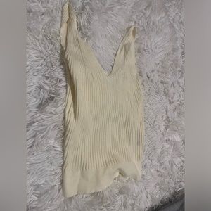 very pale yellow v-cut tank top. very soft and stretchy.